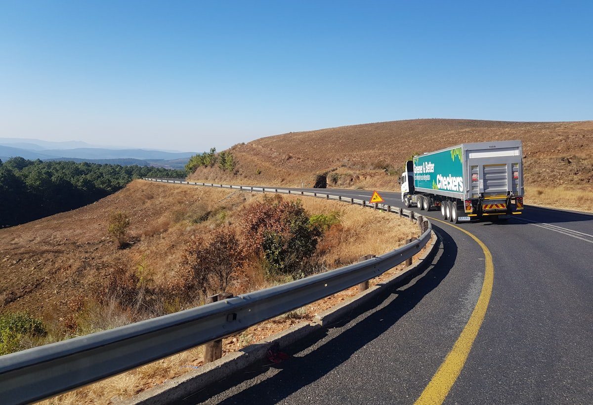 Fleet of delivery trucks on a highway